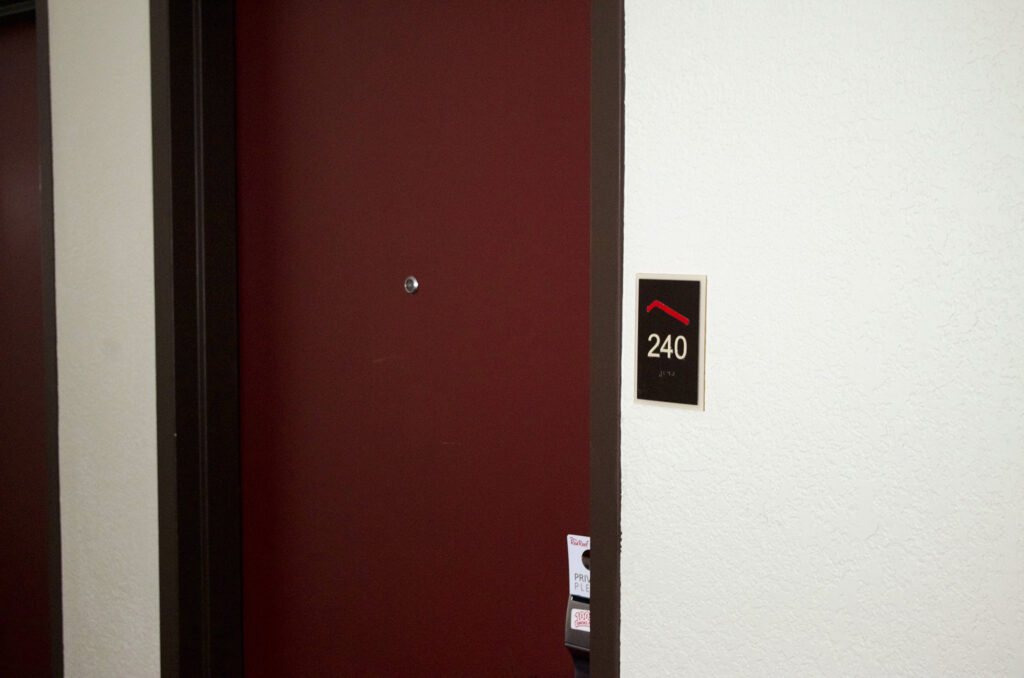 Outside door of room 240 by Valley Society